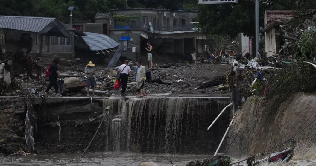 11 dead and 27 missing in flooding around Beijing after days of rain