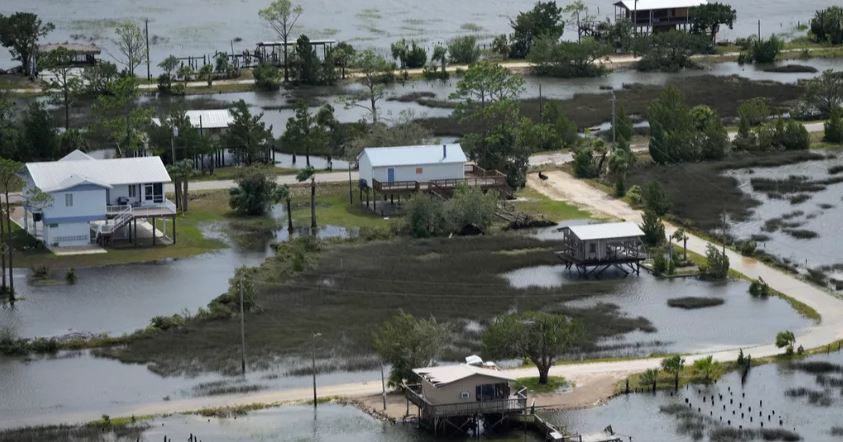 Hurricane Idalia hits Florida with 125 mph winds, flooding streets, snapping trees and cutting power