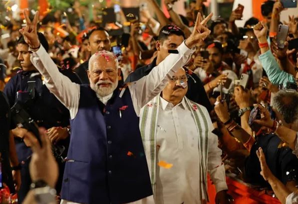 Narendra Modi celebrates victory in India vote