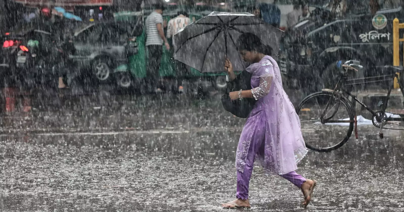 Heavy rain brings relief and chaos to Dhaka