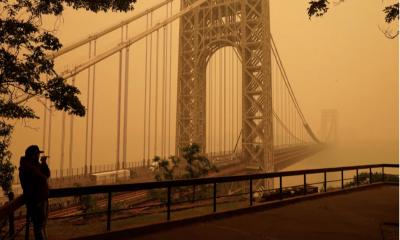 Millions breathing hazardous air as smoke from Canadian wildfires streams south over US