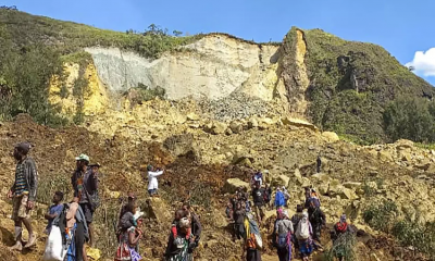 Papua New Guinea government says Friday’s landslide buried 2,000 people and formally asks for help