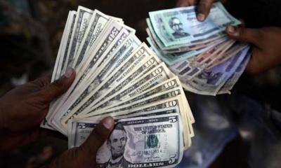 Banks reduce dollar rate by Tk 0.5