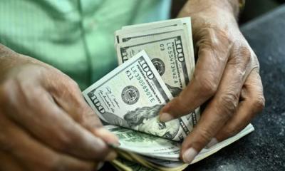 Despite new exchange system dollar stays above Tk 118