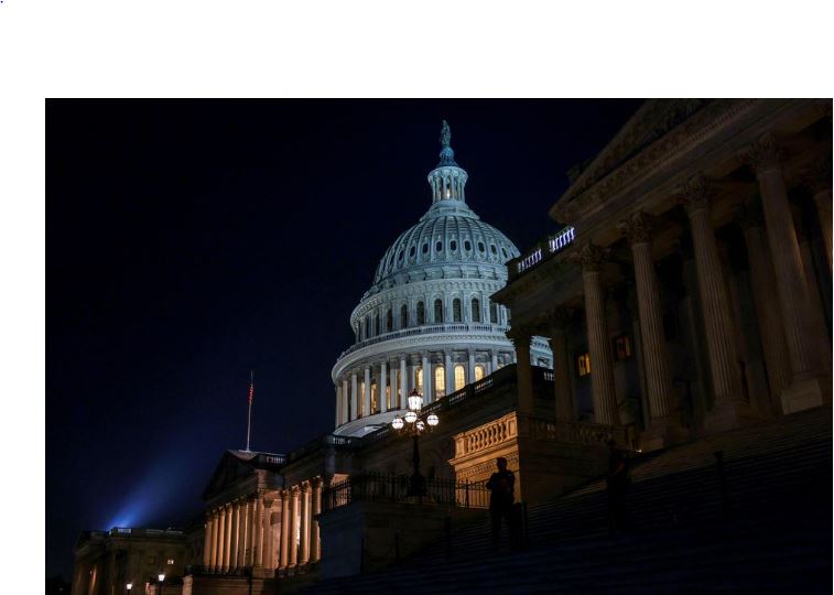 US Congress averts historic default, approves debt-limit suspension