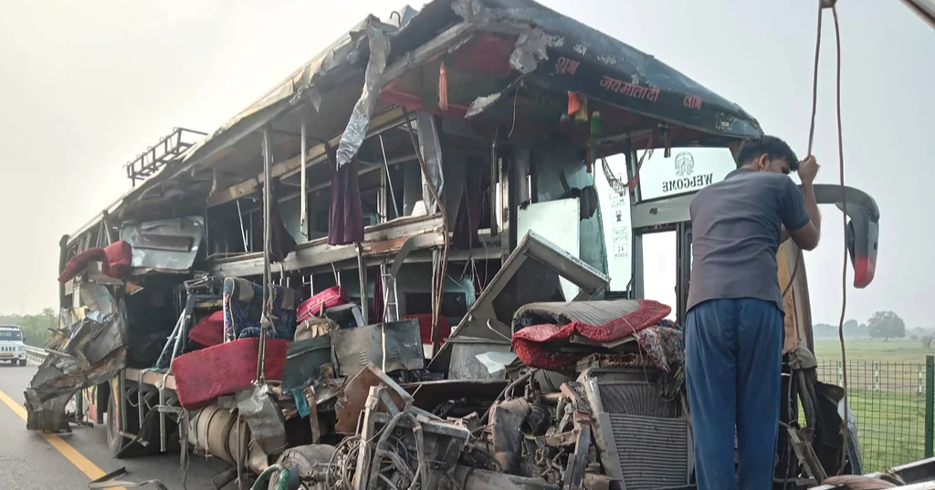 A double-decker bus collides with a milk truck in northern India, killing at least 18 people