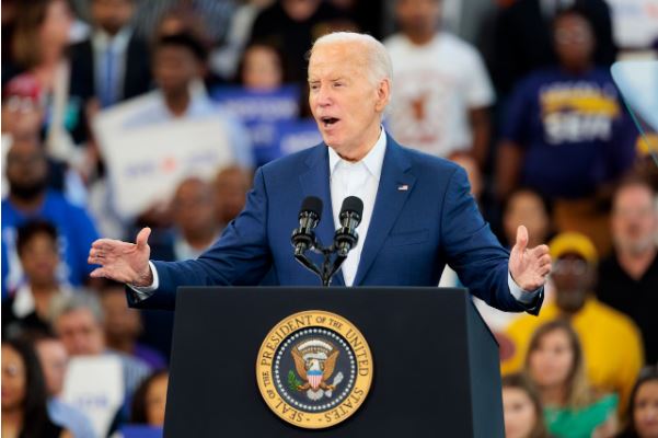 Biden says not going anywhere as he slams Trump