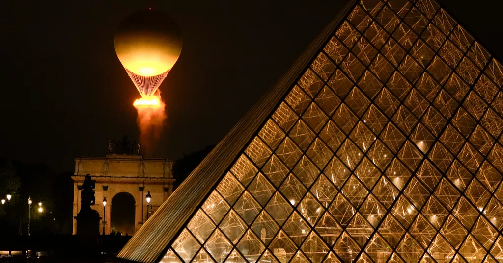 Paris dazzles with a rainy Olympics opening ceremony on the Seine River