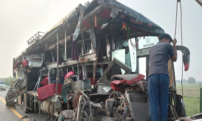 A double-decker bus collides with a milk truck in northern India, killing at least 18 people