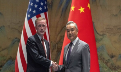 A top White House official says US and China are working to avoid conflict at talks in Beijing