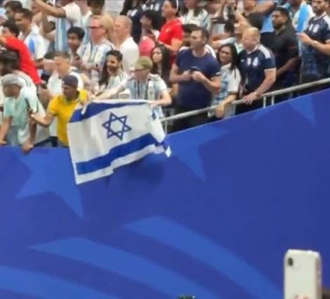 Argentina fan waves Israeli flag during Egypt World Cup clash
