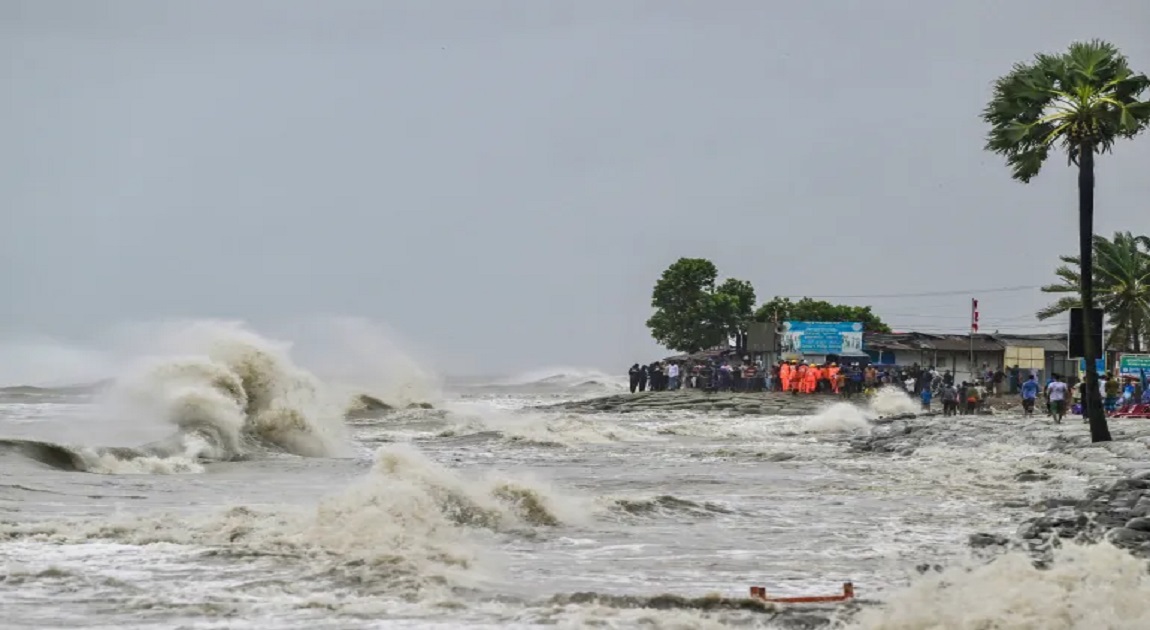 Deep depression makes landfall, storm surge threatens 14 coastal districts