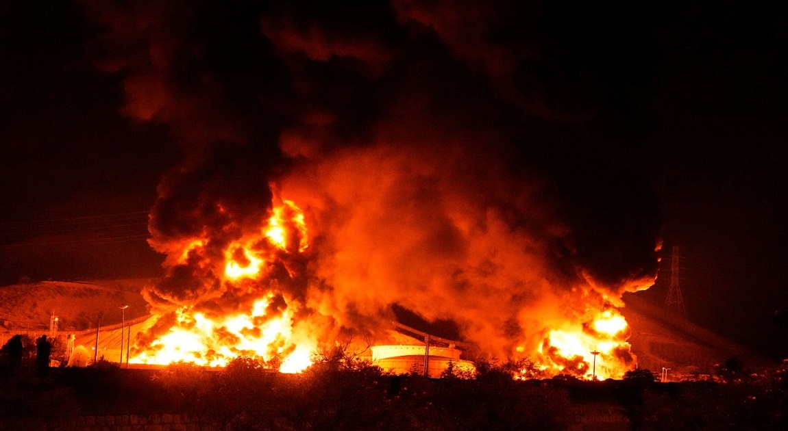 Iran fires missiles at Israel, killing 10, following strikes on oil facilities