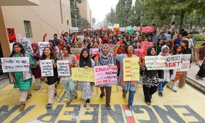 KUET students take a stand against administration and student politics by displaying red cards