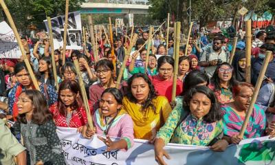 Stick procession held at Dhaka University protesting rising incidents of rape and violence against women