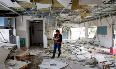 Iran missiles hit Israel as US issues Hormuz warning