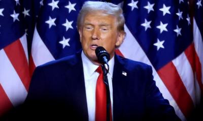 Trump says US in talks with Iran as war enters third week