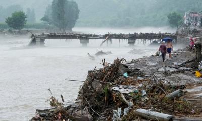Heavy rain in Beijing leaves 30 dead, triggers widespread damage