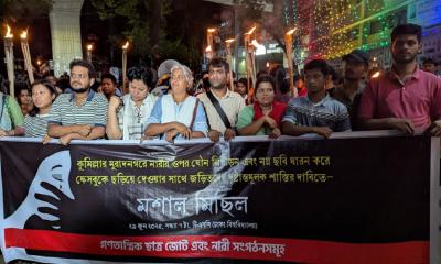 Torch procession at DU protests sexual violence in Muradnagar