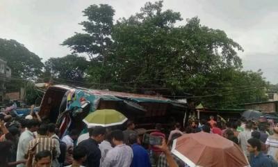 Bus overturns onto shop in Feni, 3 killed, 15 injured