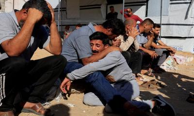 30 including rescue official, local journalist killed in Gaza