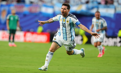 Lionel Messi‍‍`s hat-trick leads Argentina to a 3-0 win over Algeria