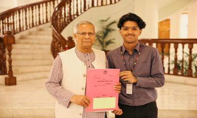 Chief adviser hands over Purbachal plot deed to Sagar-Runi’s son Megh
