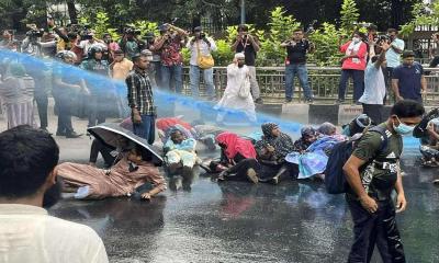 Police use water cannons, sound grenades to disperse protesters