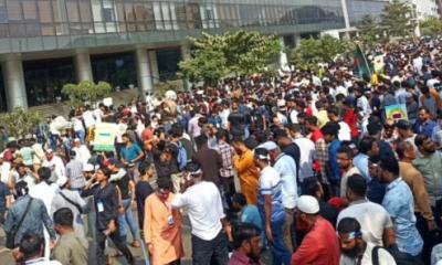 Mobile phone traders blocked Agargaon road over the move to shut down unapproved handsets