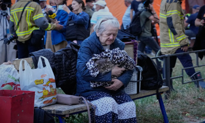 Russian missile barrage across Ukraine’s capital kills at least 12 and wounds 33