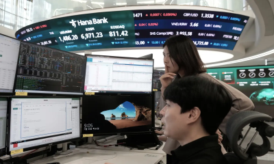 World shares mostly decline with South Korea’s Kospi down 6.4%, while oil prices slip