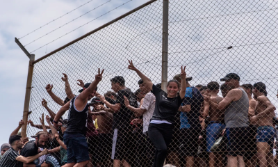 At least 18 die after thousands breach border between Morocco and Spanish territory of Ceuta