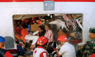 Rescuers recover last victims from Indonesia train wreck that killed 14 and injured dozens