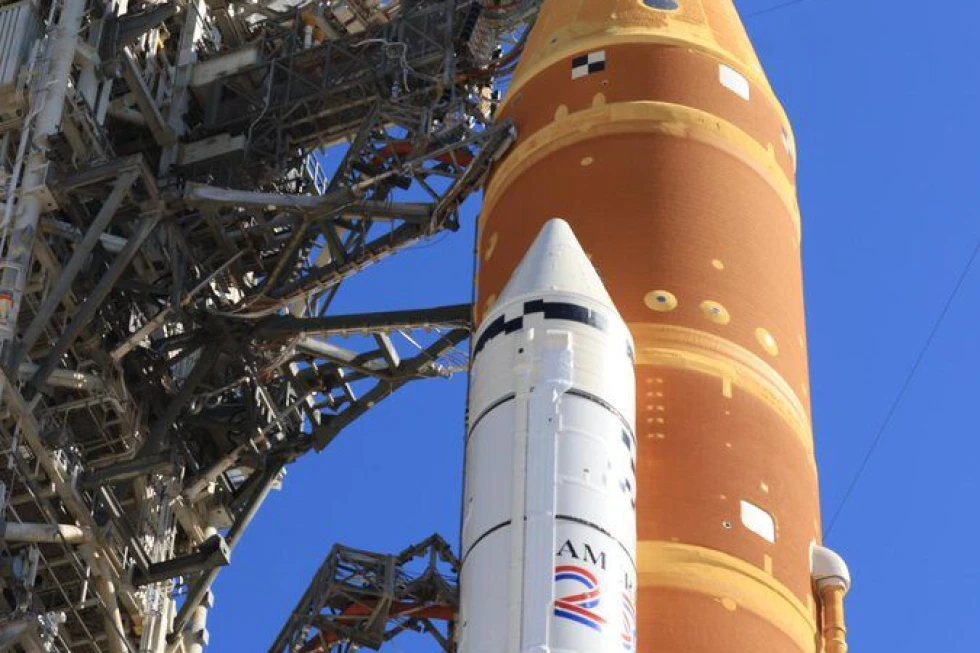 NASA will return its moon rocket to the hangar for more repairs before astronauts strap in