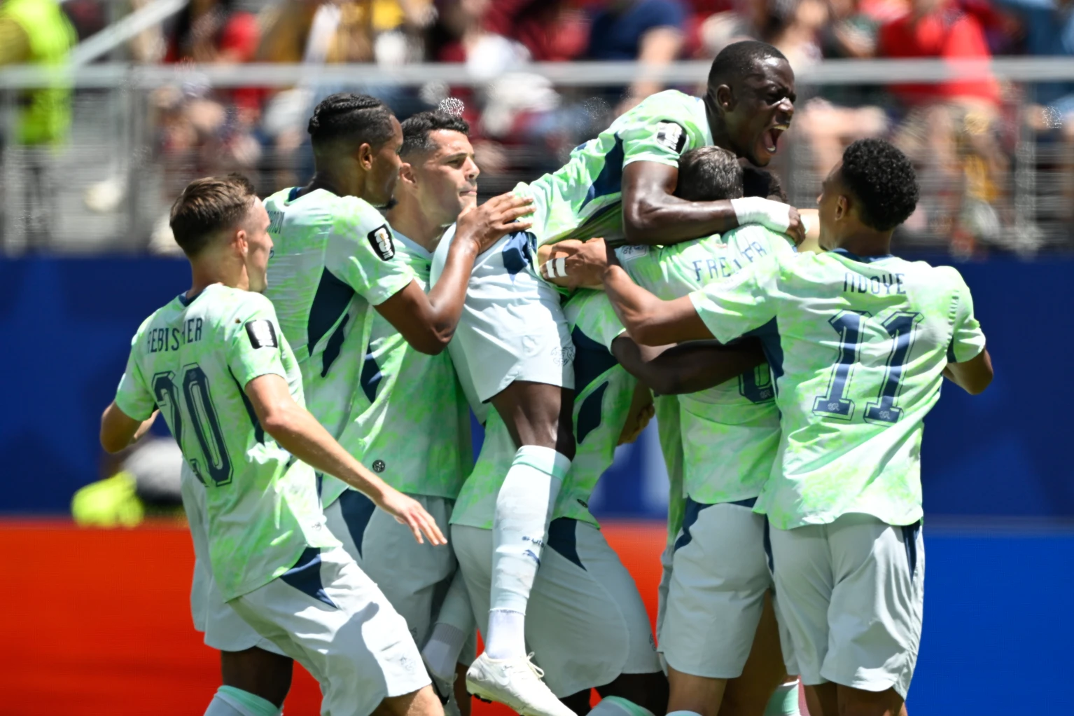 Boualem Khoukhi’s goal on header in stoppage time earns Qatar a 1-1 World Cup draw with Switzerland