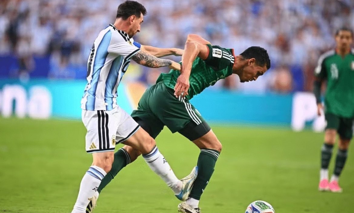 Algeria file complaint with FIFA over Messi tackle