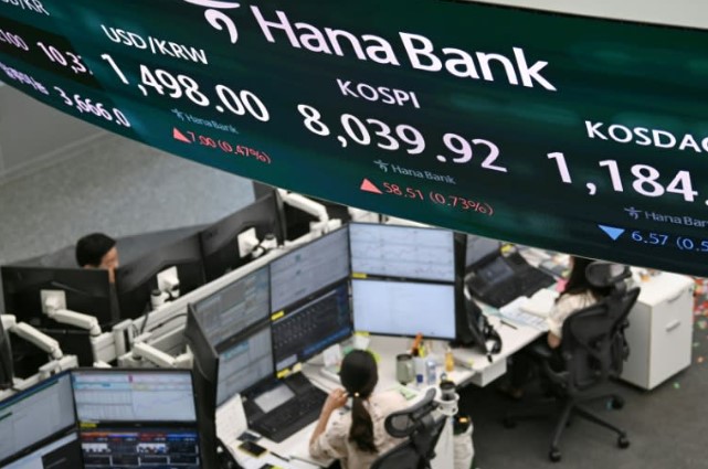 Asian stocks take another hit from AI, Mideast worries