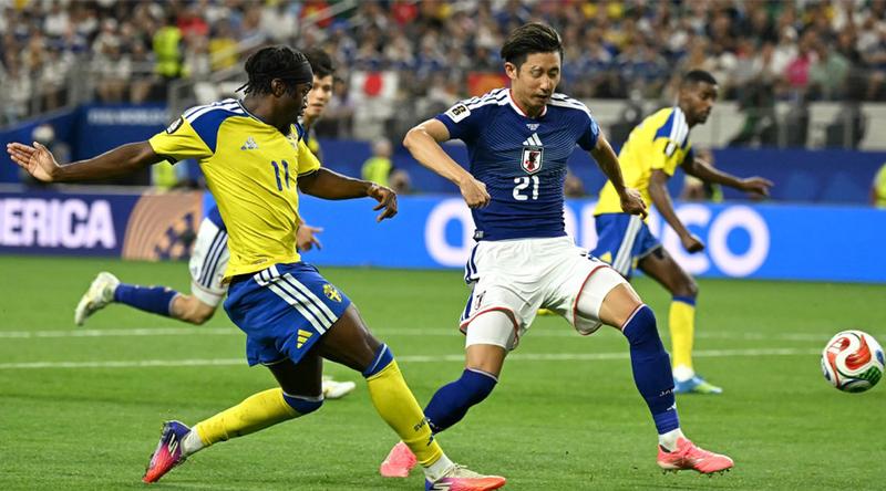 Japan reach World Cup knockouts after 1–1 draw with Sweden; set up Brazil clash