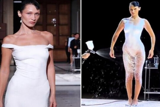 Bella Hadid gets white dress spray-painted during Paris Fashion Week