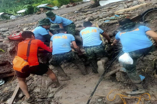 At least 72 dead, dozens feared missing as storm lashes Philippines