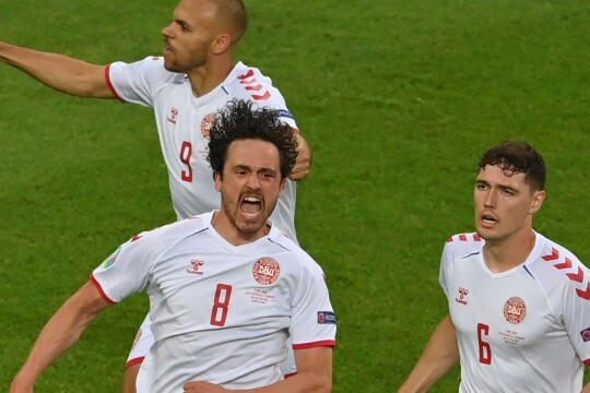 Emotionally charged Denmark edge into the Euro semi-finals