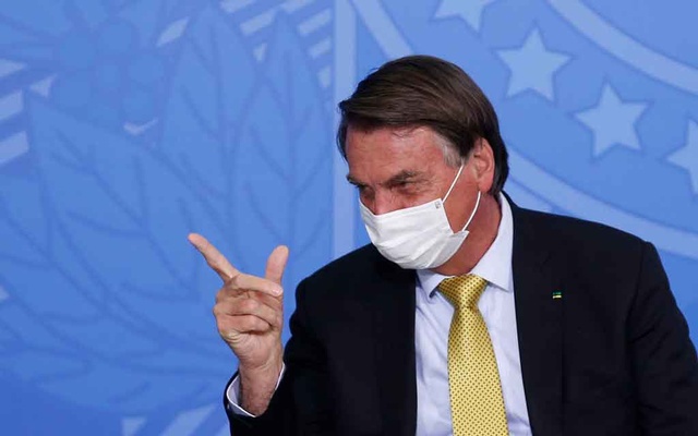 Brazil's unvaccinated president barred from soccer match