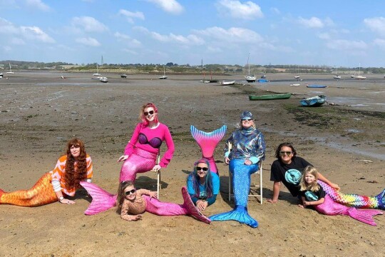 Swimmers dress up in mermaid to protect rivers