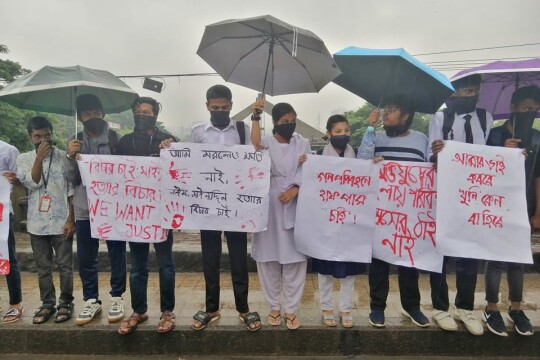 Protesters take to streets despite inclement weather