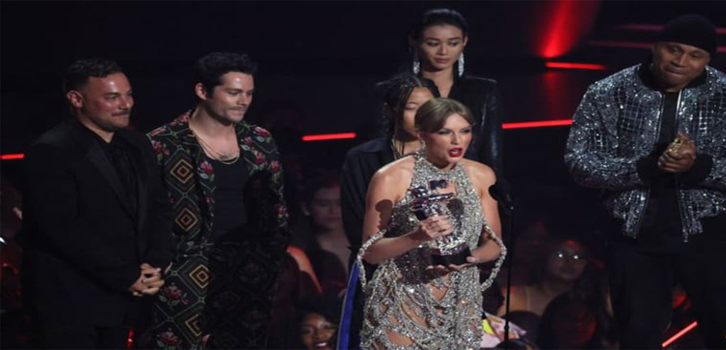 Taylor Swift wins top MTV video award, announces new album