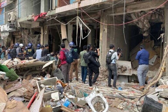 Gulistan blast: Rescue workers search for a way down to the basement of the collapsed building