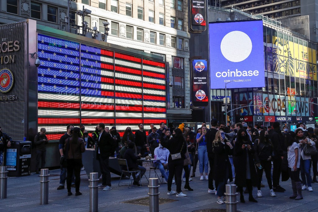 Coinbase makes market debut amid cryptocurrency frenzy