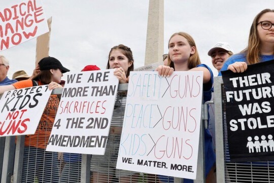 Thousands rally for stricter US gun laws